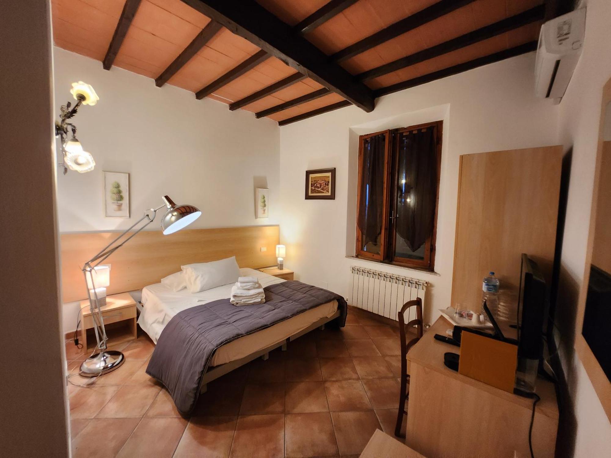 Отель Casa Cecchi Сиена Номер фото